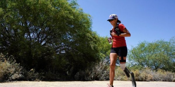 Jacky Hunt-Broersma runs her 102nd marathon in 102 days, this one at Veterans Oasis Park, Thursday, April 28, 2022, in Chandler, Ariz. (AP Photo/Ross D. Franklin)