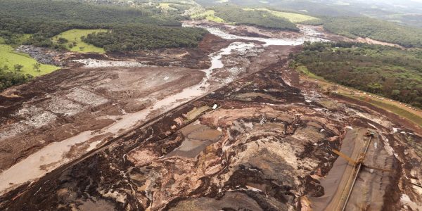 An aerial view shows the area of a collapsed dam in Brumadinho, Brazil, Saturday, Jan. 26, 2019. Rescuers searched for survivors in a huge area in southeastern Brazil buried by mud from the collapse of dam holding back mine waste, with several people dead and hundreds missing.  (AP Photo/Andre Penner)