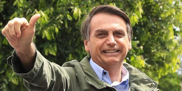 RIO DE JANEIRO, BRAZIL - OCTOBER 28: Jair Bolsonaro, far-right lawmaker and presidential candidate of the Social Liberal Party (PSL), gestures after casting his vote during general elections on October 28, 2018 in Rio de Janeiro, Brazil.  (Photo by Buda Mendes/Getty Images)